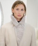 Reversible shearling coat